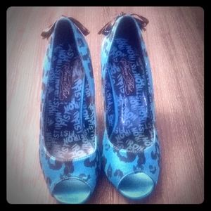 Iron fist Turquoise blue and black leopard print